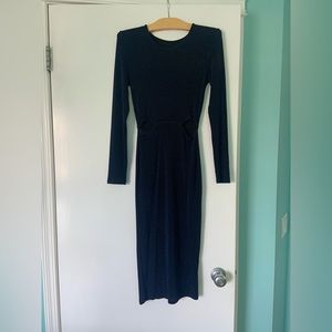 Unique find, originally from a retro shop in the UK and made by the shop. Size s